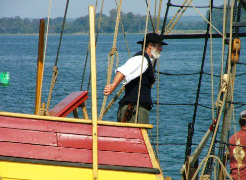 Dove Captain or helmsman The captain of the Maryland Dove scans the horizon for the missing island.