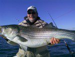 Rockfish Burt Rodgers Dec Ches Burton Rogers with a rockfish that defies the predictions of scientists for the 2010 season.