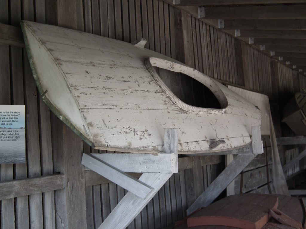 This boat was designed to slide across ice covered river and bays, with the top painted white to blend in with the ice. One of scores of various vessels of all sizes at the Chesapeake Bay Maritime Museum at St. Michaels, Md. THE CHESAPEAKE TODAY photo