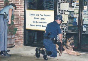 Burglars hit St. John's Pharmacy. K-9 Tarras and Dep. Phil Joseph, Dep. William Bell