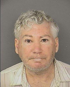 David Lee Garrison, charged with possession of alcohol at bus stop near homeless shelter
