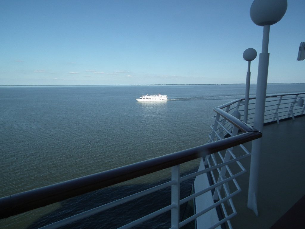 Two of the ways to cruise the Chesapeake Bay, on the American Star shown here from the deck of the Grandeur of The Seas. THE CHESAPEAKE TODAY photo
