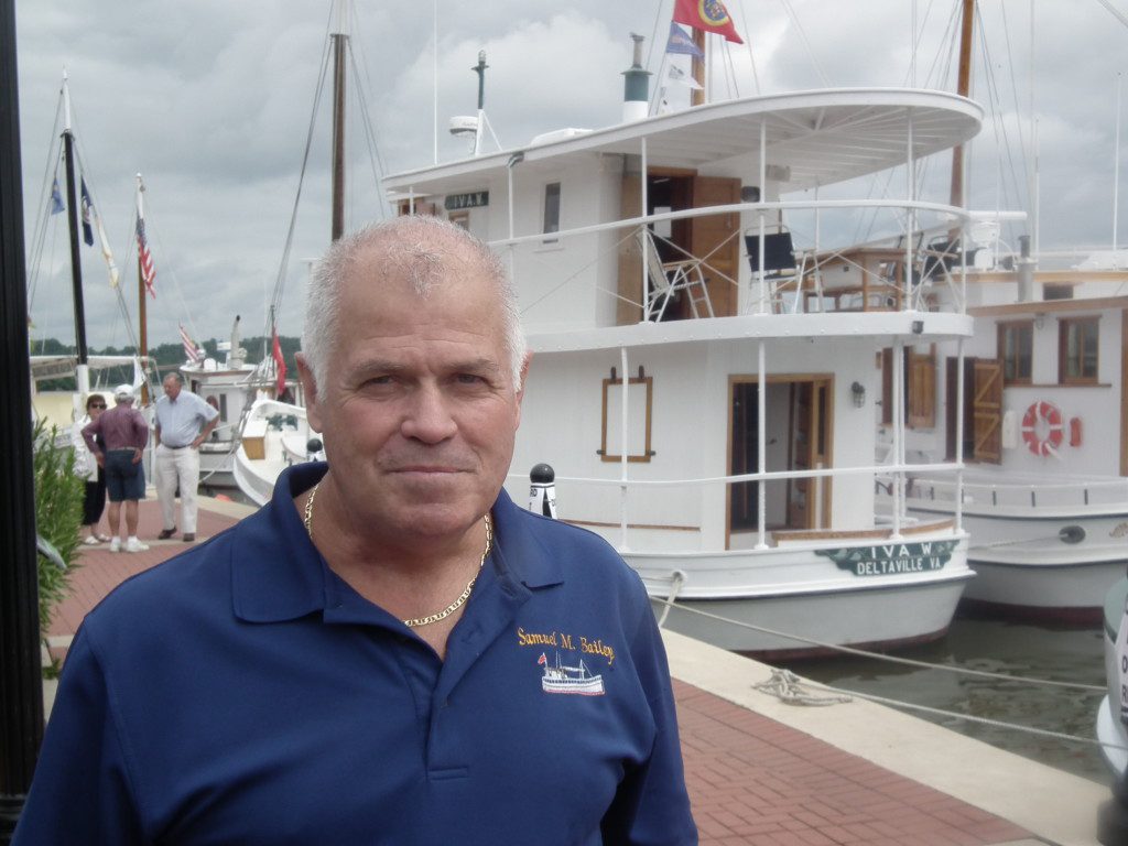 Sam Bailey, the grandson of the man for whom the Samuel M. Bailey was named, visited the assembly of famous Chesapeake Bay Oyster Buyboats. Bailey noted that his brother's boat, the Samuel M. Bailey, is the youngest of those buyboats in the flotilla. It was built in 1957. THE CHESAPEAKE TODAY photo