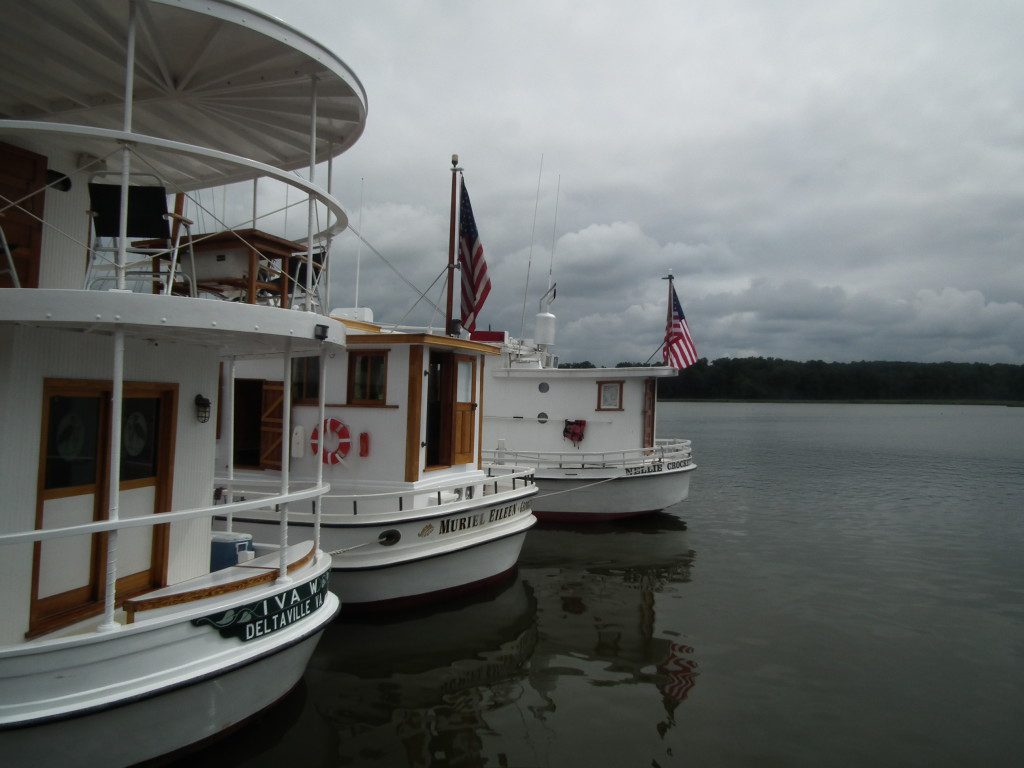 A stern day on Breton Bay as the world's largest flotilla of Chesapeake Bay Oyster Buyboats assembles for free public tours guided by those who have lovingly preserved this famous vessels.  THE CHESAPEAKE TODAY photo 
