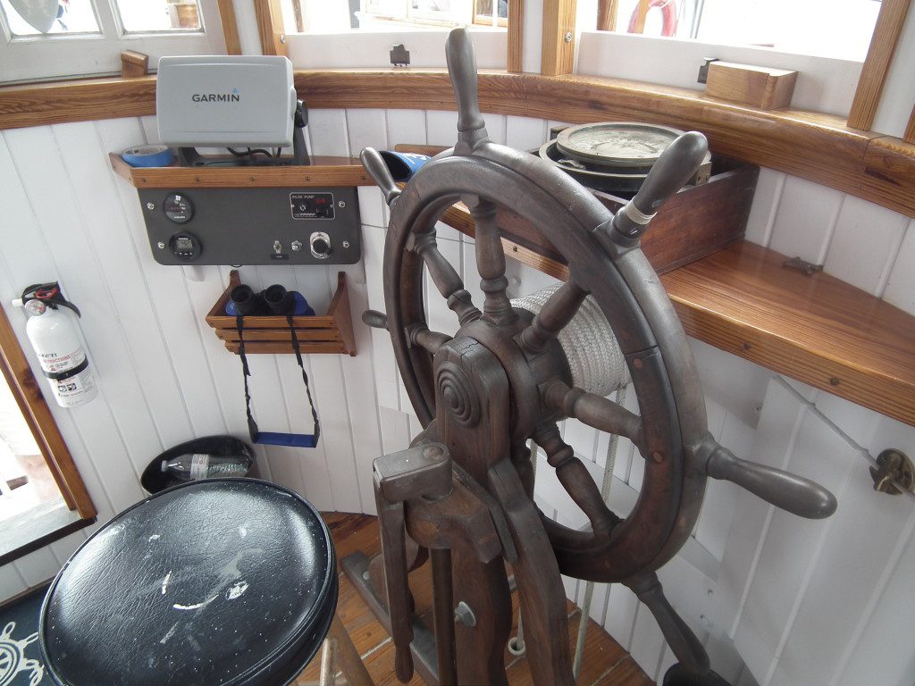 The wheelhouse of the F. D. Crockett shows the painstaking care which has been provided by the teams of volunteers at the Deltaville Maritime Museum to bring the historic oyster Buyboat back to life.  John England said that the ship was headed towards the boat graveyard as shown below on Nomini Bay, when the volunteers decided to tackle the task.  THE CHESAPEAKE TODAY photo. 