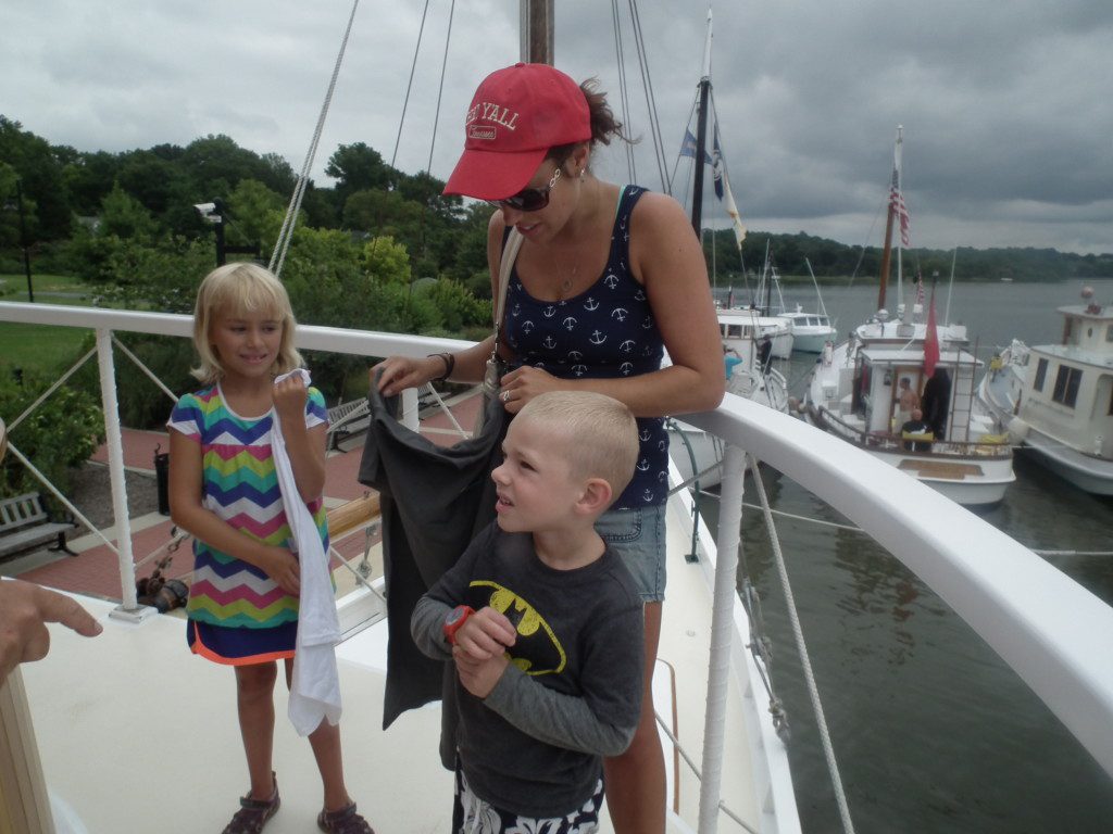 On the Iva W, Eva, Benny and their mom Veronica are treated to tee shirts by the owner. THE CHESAPEAKE TODAY photo