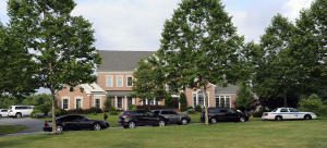 Police and FBI raid home of Jeffrey Cohen. Photo courtesy of The Baltimore Sun.