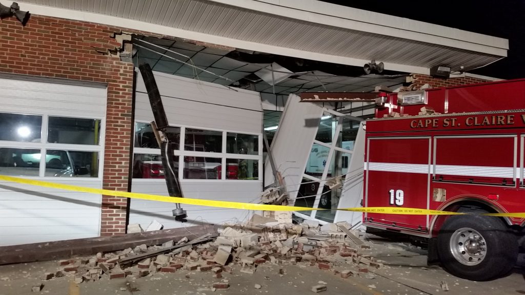 Cape Saint Claire station shows building damaged by backing fire engine.  Photo Anne Arundel Fire Dept.