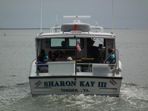 Sharon Kay heads for Tangier Island in warm weather. Now she will be escorted by the Maryland NRP cutter J. Millard Tawes cutting a path in the ice. THE CHESAPEAKE TODAY photo
