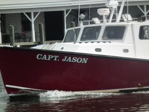 The Capt. Jason heads into Crisfield harbor which now is the center of criminal activity of commercial watermen raiding oyster sanctuaries.  THE CHESAPEAKE TODAY photo