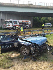 Anne Arundel police car turned into convertible after being hit by motorist. Anne Arundel County Fire Department photo