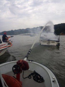 Fighting fire on the river. Goodtime girl was burned almost the waterline, then sunk.   Susquehanna Hose Co. photo