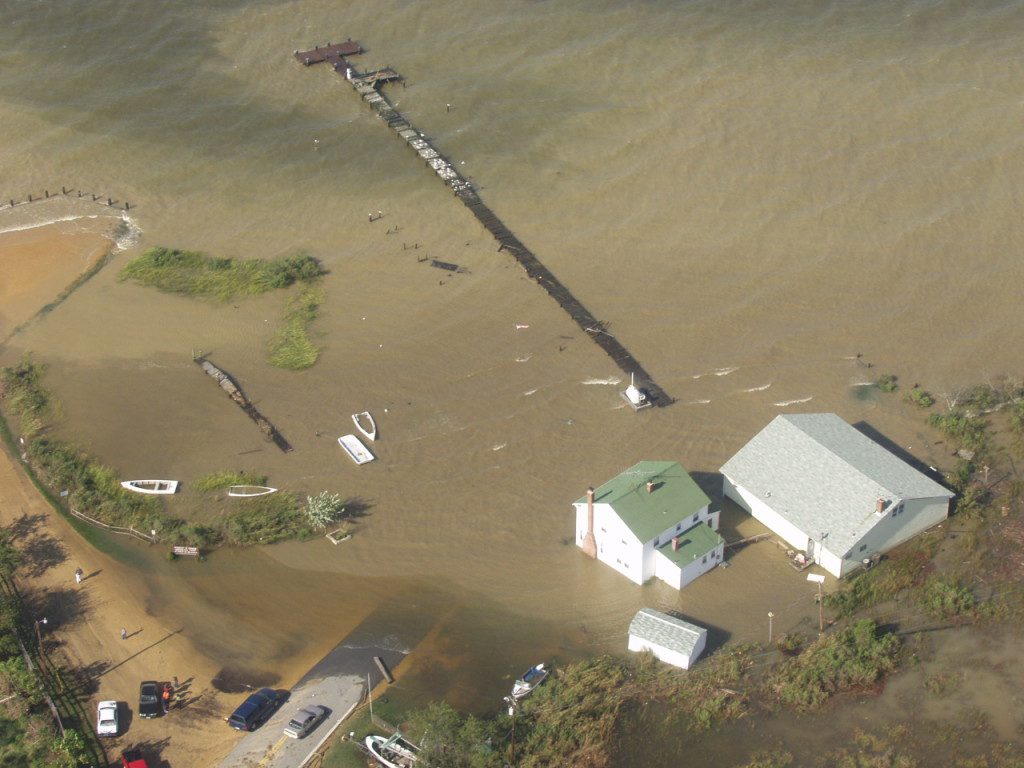 Wicomico River off of the Potomac River took a direct hit as the hurricane crossed Virginia. This view is of Quade's Store at Bushwood Wharf. The store, shown at right, is built high off the water and suffered little damage.