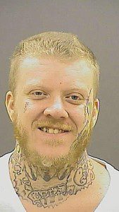 Christopher Davis 33 charged with assault handgun violation
