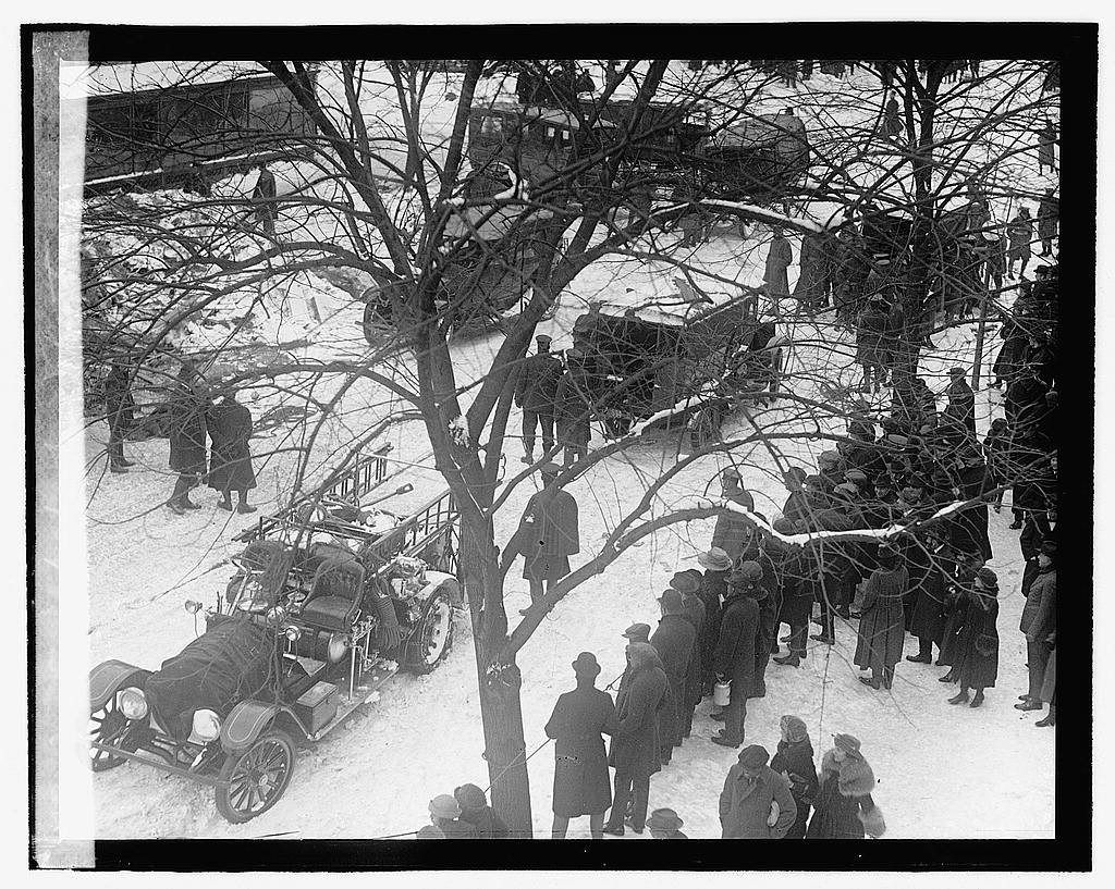 Firetrucks and ambulances at the Knickerbocker Theatre disaster in snowstorm of Jan 28, 1922