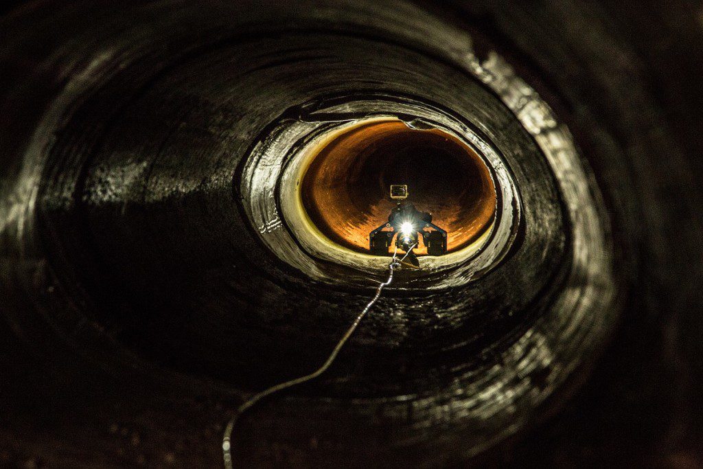 An unmanned robot with a video camera travles down a tunnel near the Mexican border in Nogales, AZ. The robot is used in tunnels that are normally to small or unsafe for someone to crawl down.