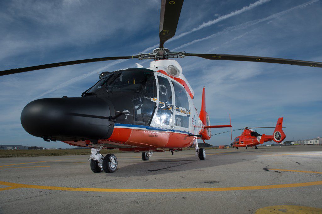 Coast Guard MH-60 Jayhawk helicopters stand ready at Air Station Elizabeth City Wednesday, March 10, 2016. Air Station Elizabeth City helicopter crews were at Kill Devil Hills to celebrate the centennial anniversary of the Coast Guard's aviation program with formation flights and a classic painting scheme. (U.S. Coast Guard photo by Auxiliarist David Lau)
